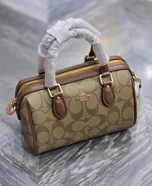 MINI ROWAN CROSSBODY BAG IN BLOCKED SIGNATURE CANVAS