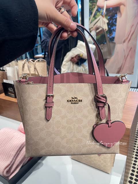 Coach Mollie Tote Bag 25 In Signature Canvas With Heart Charm