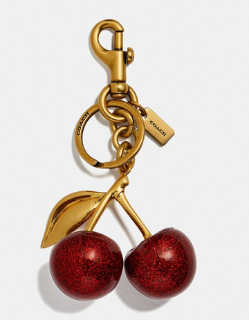 COACH gold-tone cherry bag charm